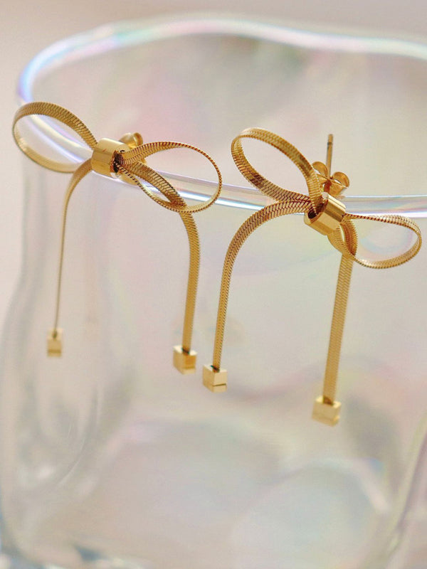 Collier et boucles d'oreilles en os de serpent de base de niche, frais et doux