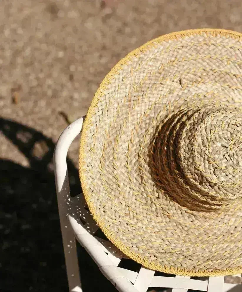 Balinese Pecatu Wide Round Straw Hat In Butter Yellow