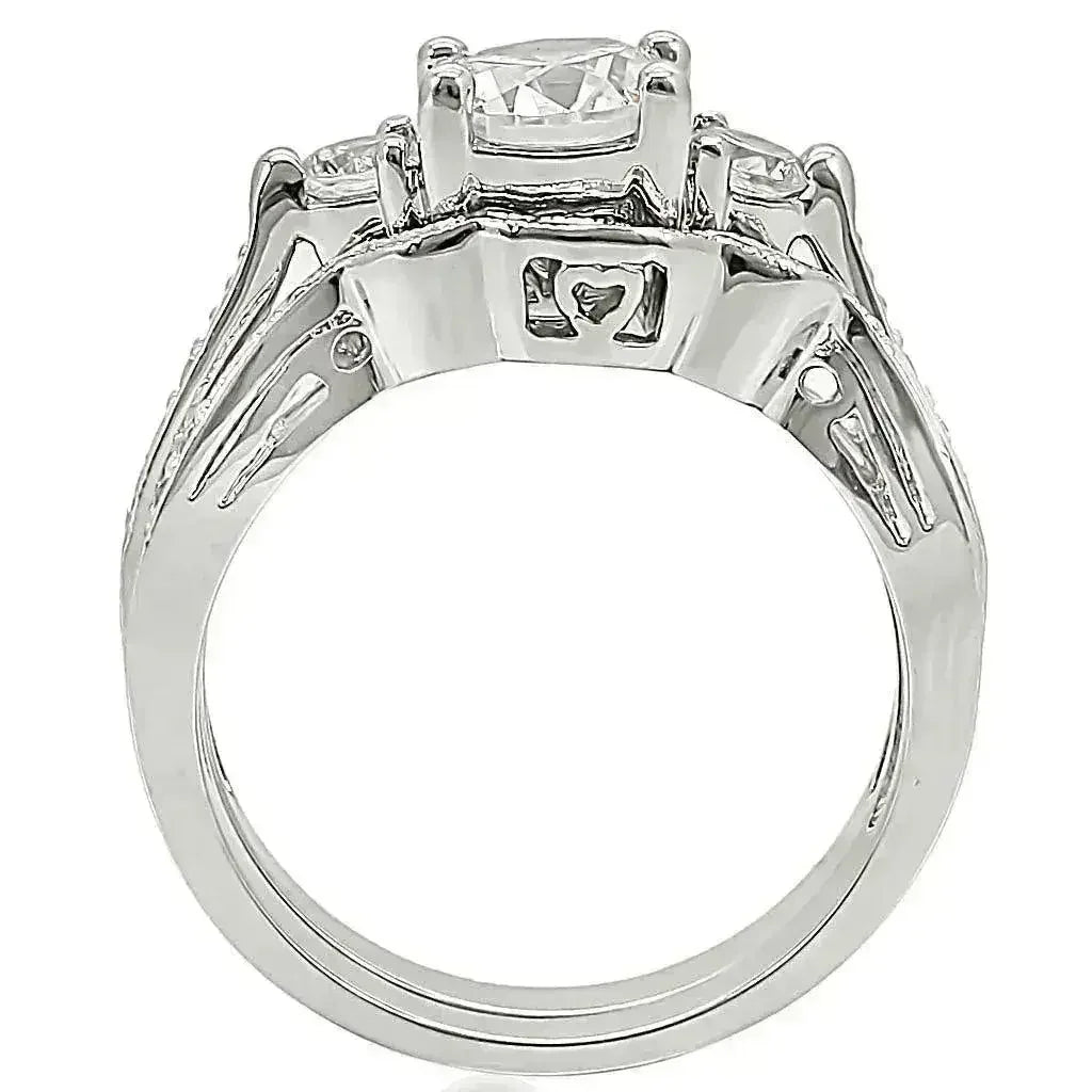 1W002 Rhodium Brass Ring – 7mm AAA Clear CZ Solitaire