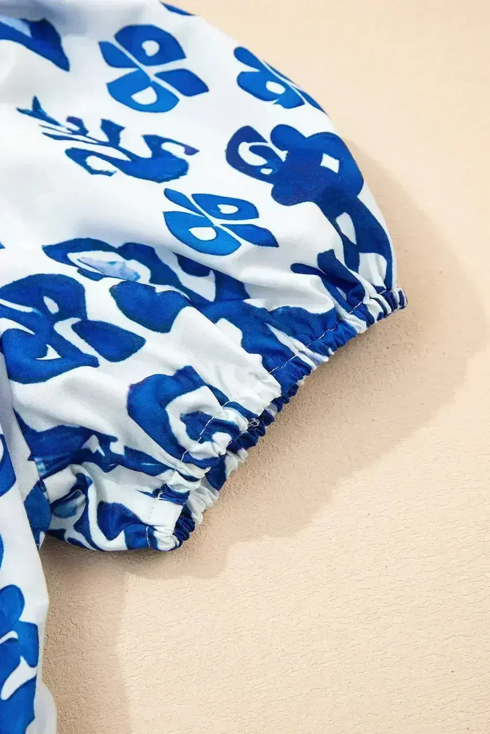 Blue Floral Ruffle Hem Pop of Color Neckline Dress