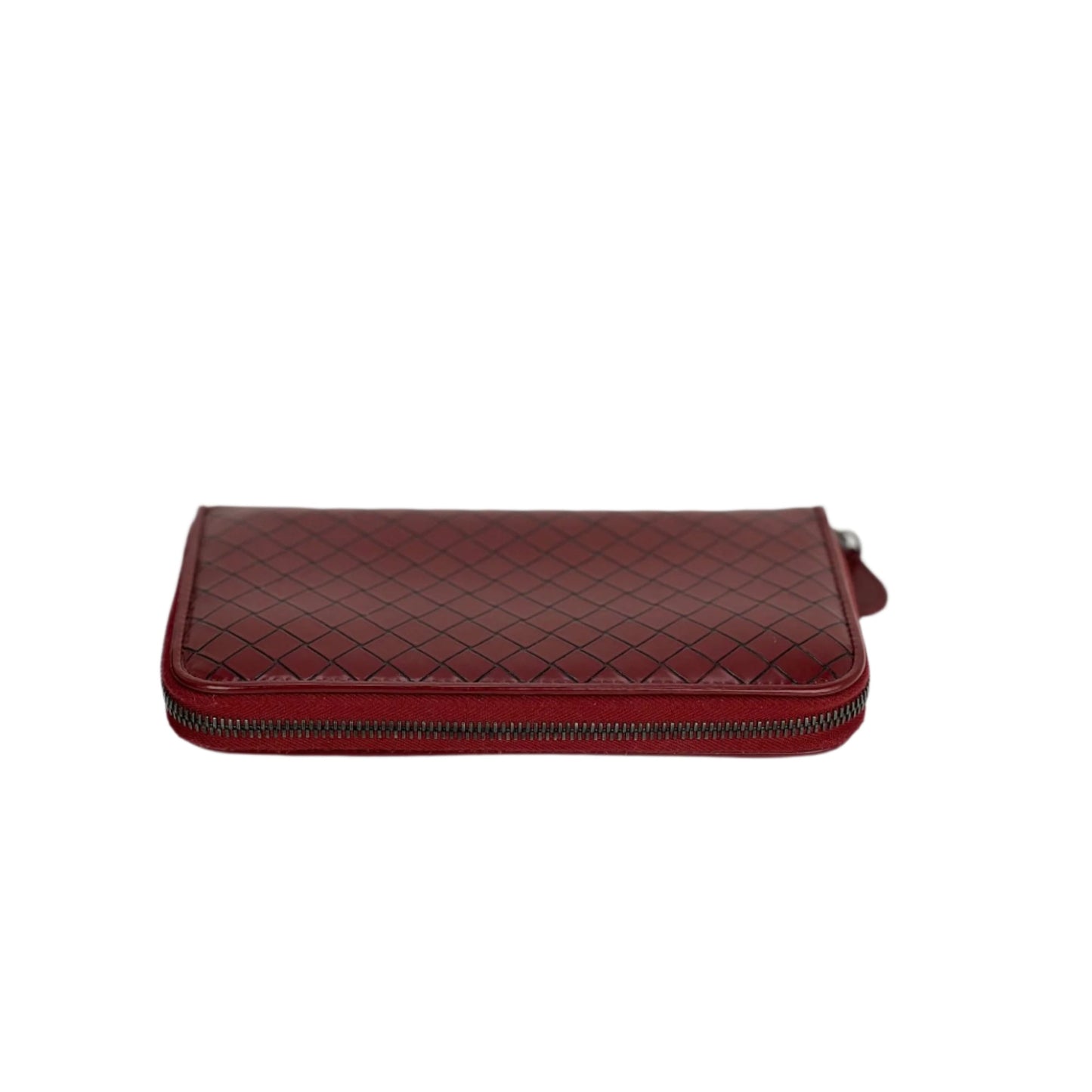 Pochette portefeuille zippée en cuir bordeaux Intrecciato de Bottega Veneta