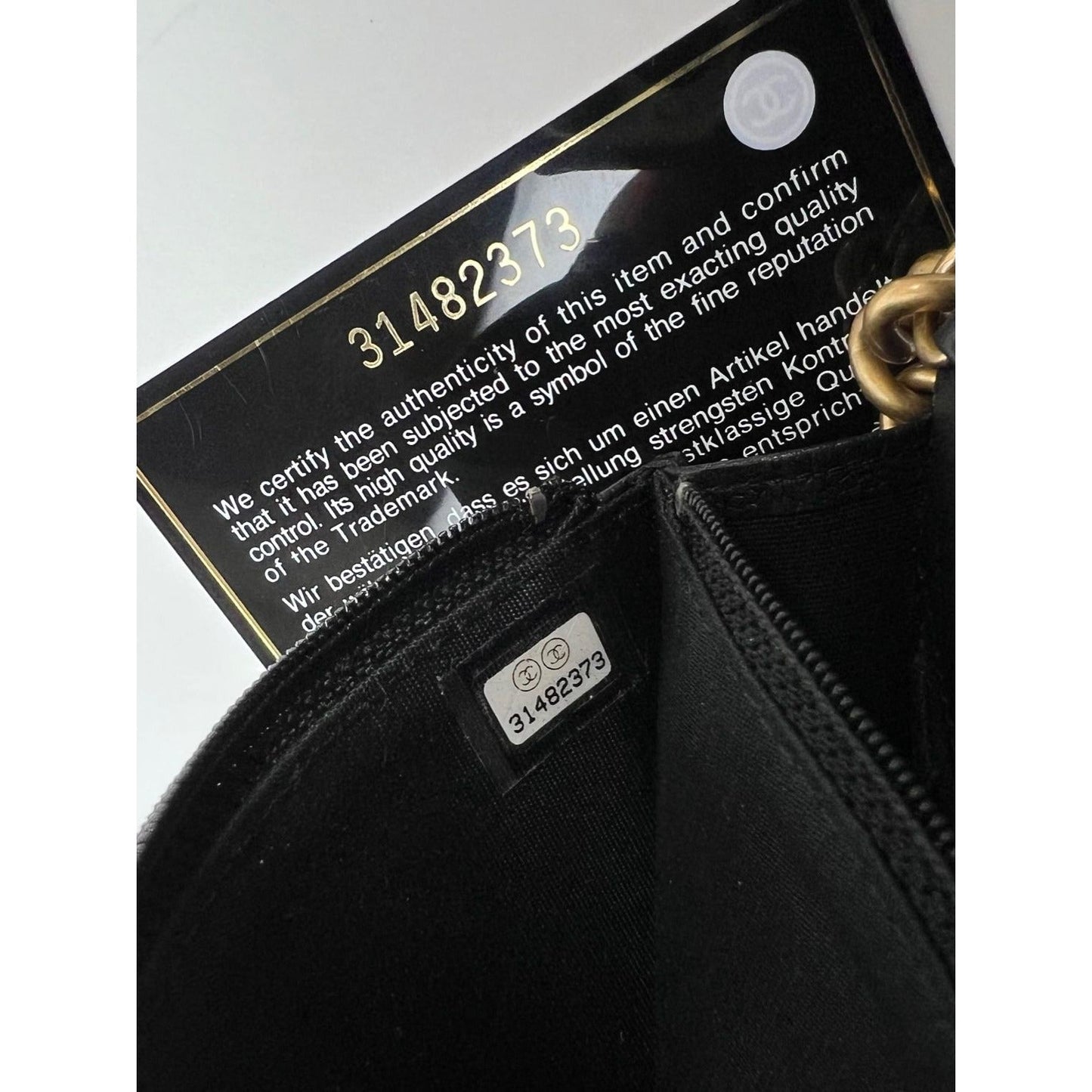 Chanel Caviar Quilted Mini Boy Clutch Wallet on a Chain Black