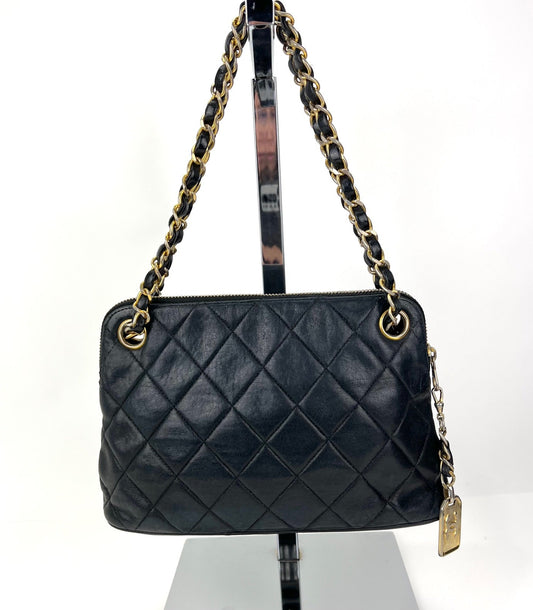 Sac CHANEL en cuir d'agneau matelassé avec chaîne, mini sac à bandoulière noir vintage, d'occasion