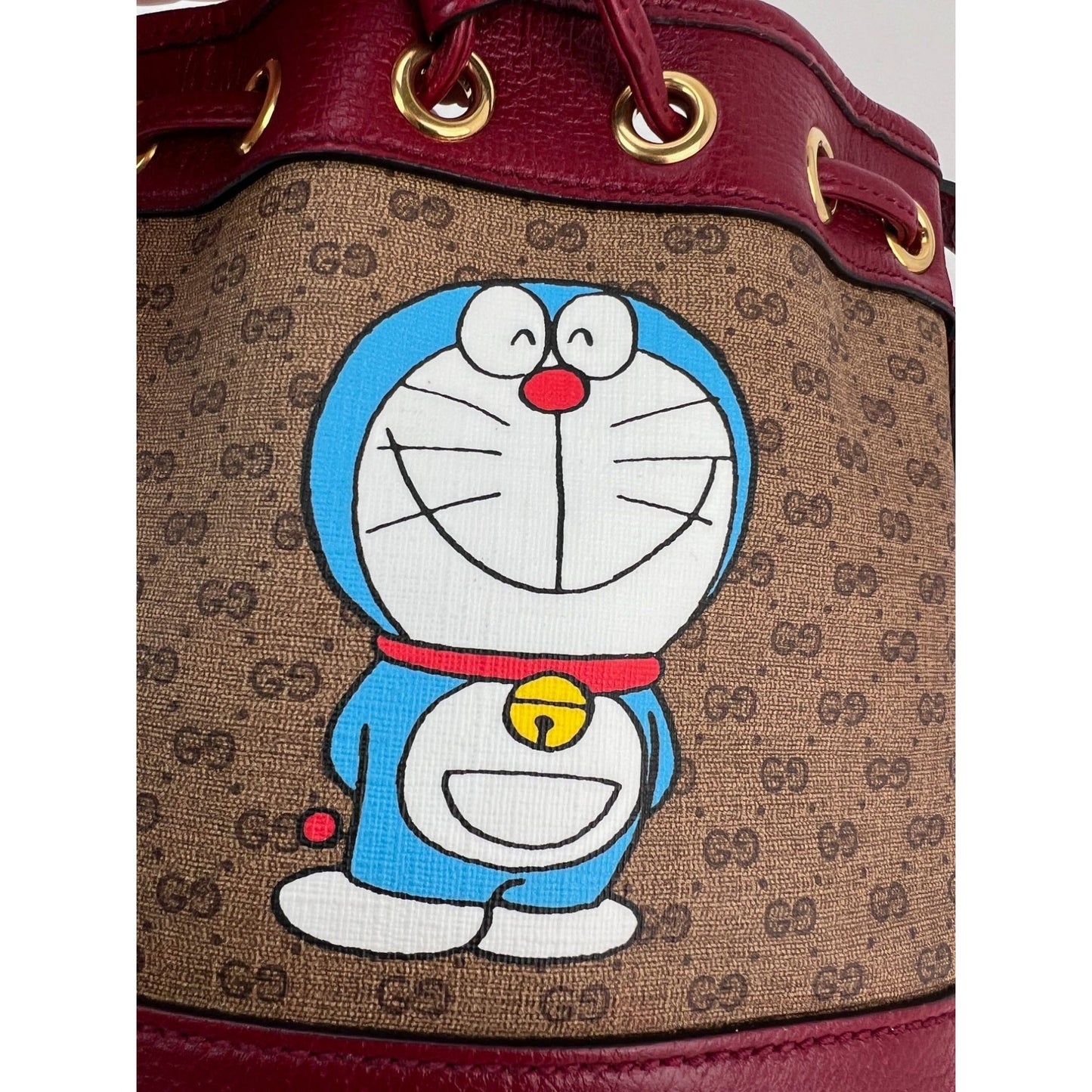 Mini sac seau Gucci X Doraemon Vintage GG Supreme